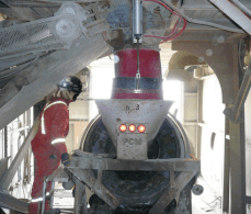 A man standing next to an old train.