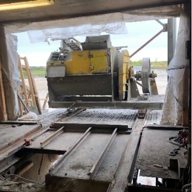 A machine is being used to cut wood.